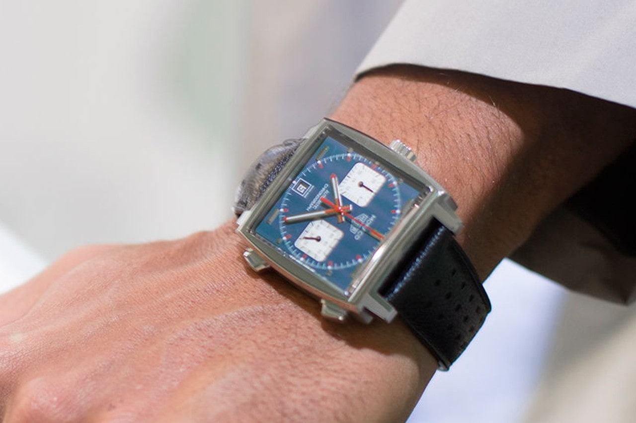 Close up of a TAG Heuer Monaco watch on a man’s wrist Close up of a TAG Heuer Monaco watch on a man’s wrist